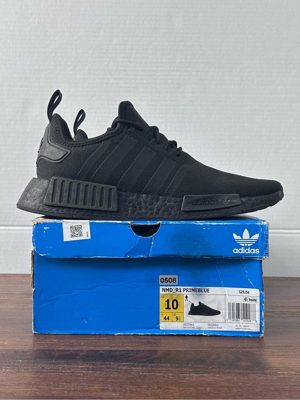 adidas NMD_R1 Primeblue Triple Black Men’s 10/Women’s 11